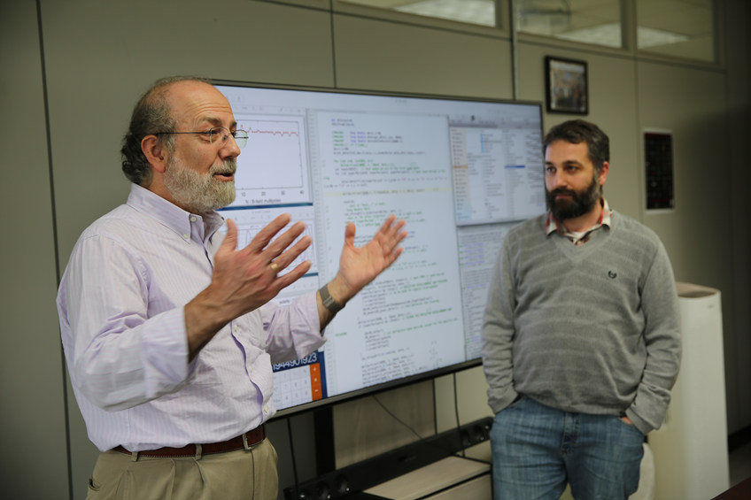 Professor Yannis K. Semertzidis, director of the IBS Center for Axion and Precision Physics (left) with Dr. Selcuk Haciomeroglu